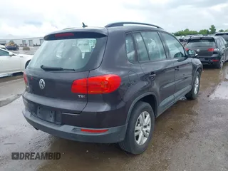 2016 Volkswagen Tiguan SE with VIN WVGAV7AX4GW580074, listed as a IAAI auction lot 42478199 with 114,357 mi miles and . Bid and sale history available at DreamBid. Image 4.
