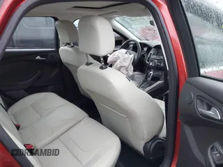 2018 Ford Focus Titanium with VIN 1FADP3J20JL280698, listed as a IAAI auction lot 41823530 with 54,841 mi miles and . Bid and sale history available at DreamBid. Image 8.