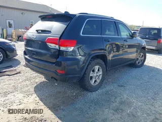2014 Jeep Grand Cherokee Laredo with VIN 1C4RJEAG0EC442053, listed as a IAAI auction lot 42098601 with 200,982 mi miles and . Bid and sale history available at DreamBid. Image 4.