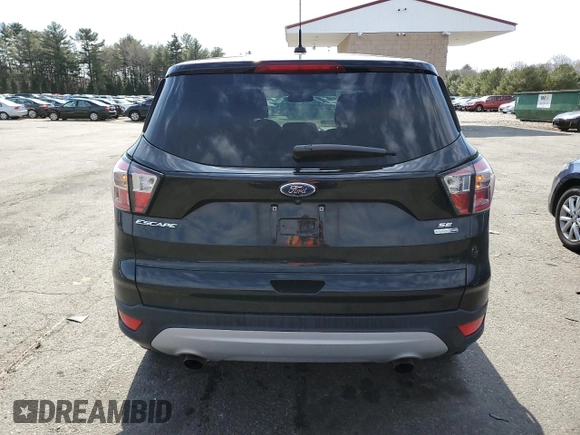2017 Ford Escape SE with VIN 1FMCU9GD6HUD14508, listed as a Copart auction lot 49112575 with 77,668 mi miles and Salvage Title. Bid and sale history available at DreamBid. Image 6.