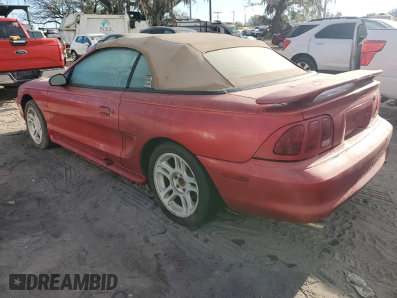 1996 Ford Mustang GT with VIN 1FALP45X6TF226699, listed as a Copart auction lot 82213754 with 102,247 mi miles and Salvage Title. Bid and sale history available at carsss.com. Image 2.