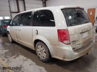 2018 Dodge Grand Caravan SE with VIN 2C4RDGBG0JR180361, listed as a IAAI auction lot 41064126 with 135,841 mi miles. Bid and sale history available at carsss.com. Image 3.