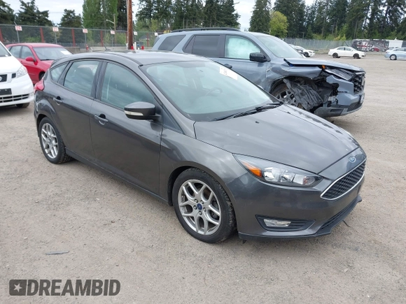 2015 Ford Focus SE with VIN 1FADP3K26FL269811, listed as a IAAI auction lot 42148333 with 157,192 mi miles. Bid and sale history available at carsss.com. Image 1.