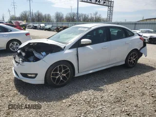 2016 Ford Focus SE with VIN 1FADP3F21GL230815, listed as a Copart auction lot 53652865 with 105,712 mi miles and Salvage title. Bid and sale history available at DreamBid. Image 1.