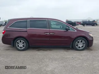 2012 Honda Odyssey EX-L with VIN 5FNRL5H61CB108301, listed as a IAAI auction lot 41939536 with 225,476 mi miles and . Bid and sale history available at DreamBid. Image 13.
