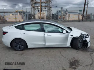 2021 Tesla Model 3 Long Range with VIN 5YJ3E1EB8MF860282, listed as a IAAI auction lot 41787008 with 49,730 mi miles and . Bid and sale history available at DreamBid. Image 13.