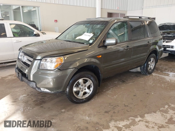 2006 Honda Pilot EX-L with VIN 5FNYF187X6B026463, listed as a IAAI auction lot 41612181 with 242,828 mi miles and . Bid and sale history available at DreamBid. Image 18.