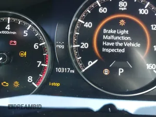 2024 Mazda CX-90 Select z VIN JM3KKAHD3R1165975, wystawiony jako IAAI lot #42086144 z przebiegiem 10 317 mil mil oraz . Historia ofert i sprzedaży dostępna na DreamBid. Obrazek 7.