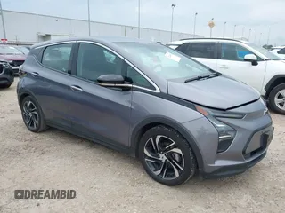2023 Chevrolet Bolt EV 2LT z VIN 1G1FX6S00P4143404, wystawiony jako IAAI lot #42144152 z przebiegiem 88 553 mil mil oraz . Historia ofert i sprzedaży dostępna na DreamBid. Obrazek 1.
