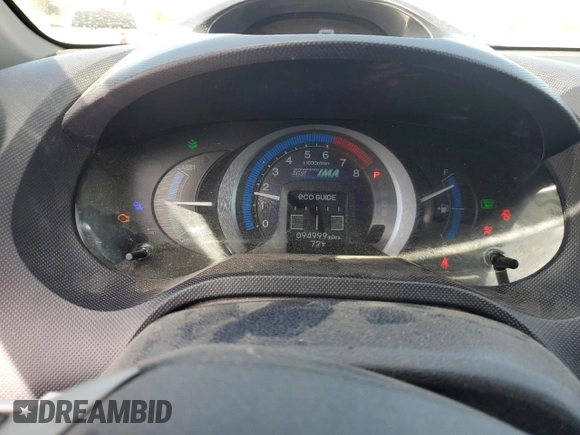 2010 Honda Insight EX with VIN JHMZE2H79AS017647, listed as a Copart auction lot 53311325 with 94,999 mi miles and Salvage Title. Bid and sale history available at DreamBid. Image 9.
