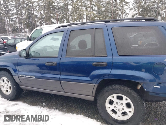 2001 Jeep Grand Cherokee Laredo with VIN 1J4GW48N21C730703, listed as a IAAI auction lot 41581667 with 111,054 mi miles and . Bid and sale history available at DreamBid. Image 15.
