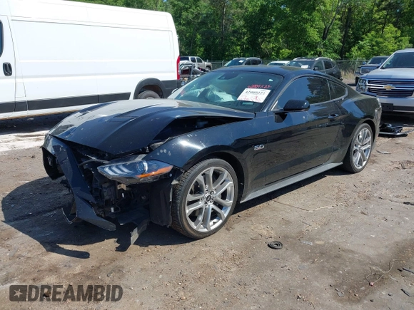2021 Ford Mustang GT z VIN 1FA6P8CFXM5156002, wystawiony jako IAAI lot #42009222 z przebiegiem 65 939 mil mil oraz . Historia ofert i sprzedaży dostępna na DreamBid. Obrazek 17.