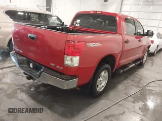 2011 Toyota Tundra 4WD Truck with VIN 5TFDW5F12BX178046, listed as a IAAI auction lot 41619191 with 186,866 mi miles. Bid and sale history available at carsss.com. Image 4.