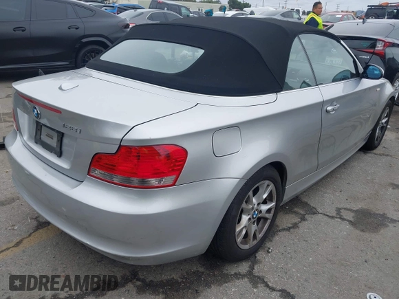 2009 BMW 1 Series 128i with VIN WBAUN13519VH81367, listed as a IAAI auction lot 41710584 with 94,462 mi miles and . Bid and sale history available at DreamBid. Image 4.