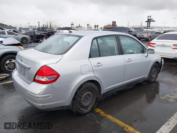 2009 Nissan Versa S with VIN 3N1BC11E39L364397, listed as a IAAI auction lot 41788772 with 223,959 mi miles and . Bid and sale history available at DreamBid. Image 4.