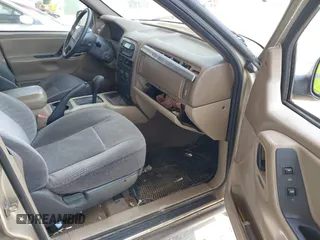 2001 Jeep Grand Cherokee Laredo with VIN 1J4GX48S81C589400, listed as a IAAI auction lot 42091559 with 219,698 mi miles and . Bid and sale history available at DreamBid. Image 5.