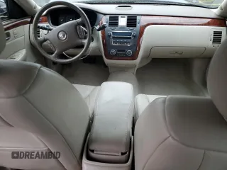 2006 Cadillac DTS 1SB z VIN 1G6KD57Y56U220535, wystawiony jako Copart lot #89196185 z przebiegiem 94 312 mil mil oraz Szkody całkowita. Historia ofert i sprzedaży dostępna na DreamBid. Obrazek 8.
