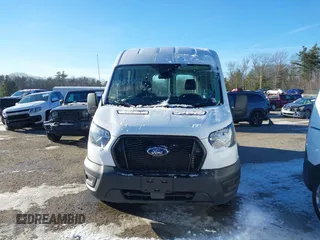 2023 Ford Transit Cargo with VIN 1FTBR1C84PKB27872, listed as a IAAI auction lot 41025498 with 6,710 mi miles and . Bid and sale history available at DreamBid. Image 12.