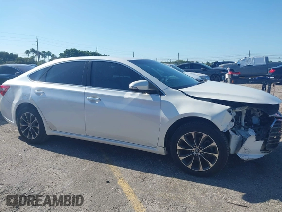 2016 Toyota Avalon Limited with VIN 4T1BK1EB1GU207322, listed as a IAAI auction lot 42030270 with 77,127 mi miles and . Bid and sale history available at carsss.com. Image 13.