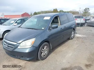2005 Honda Odyssey EX-L with VIN 5FNRL38765B070922, listed as a IAAI auction lot 41868648 with 192,518 mi miles. Bid and sale history available at carsss.com. Image 2.
