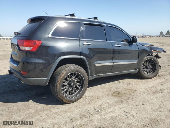 2013 Jeep Grand Cherokee Overland Summit with VIN 1C4RJFCT1DC635178, listed as a Copart auction lot 50613695 with 119,509 mi miles and Salvage Title. Bid and sale history available at carsss.com. Image 3.