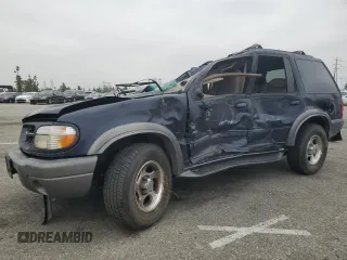 1999 Ford Explorer XLT with VIN 1FMZU34E6XZC14009, listed as a Copart auction lot 55251525 with 253,681 mi miles and Salvage title. Bid and sale history available at DreamBid. Image 1.