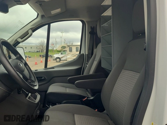 2020 Ford Transit Cargo z VIN 1FTBR2YG9LKB09125, wystawiony jako IAAI lot #42774093 z przebiegiem 98 738 mil mil oraz . Historia ofert i sprzedaży dostępna na DreamBid. Obrazek 1.