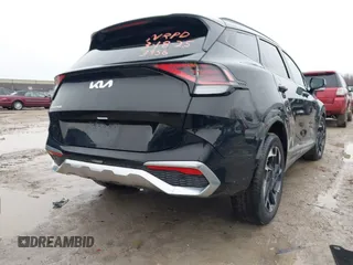 2023 Kia Sportage SX-Prestige with VIN 5XYK53AF7PG086989, listed as a IAAI auction lot 41938657 with 43,255 mi miles and . Bid and sale history available at DreamBid. Image 4.