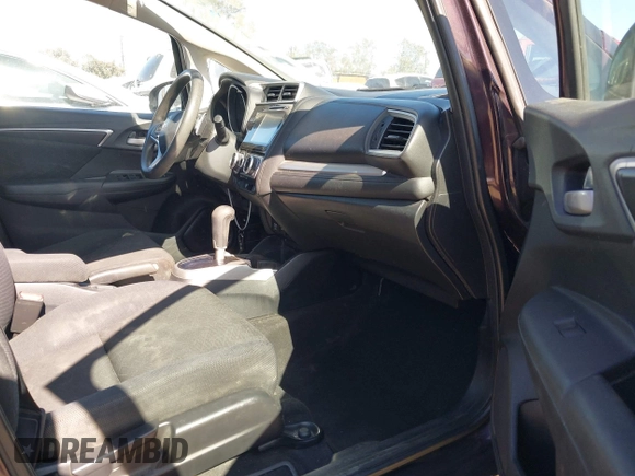 2015 Honda Fit EX-L z VIN 3HGGK5H80FM725959, wystawiony jako IAAI lot #42526513 z przebiegiem 110 885 mil mil oraz . Historia ofert i sprzedaży dostępna na DreamBid. Obrazek 5.