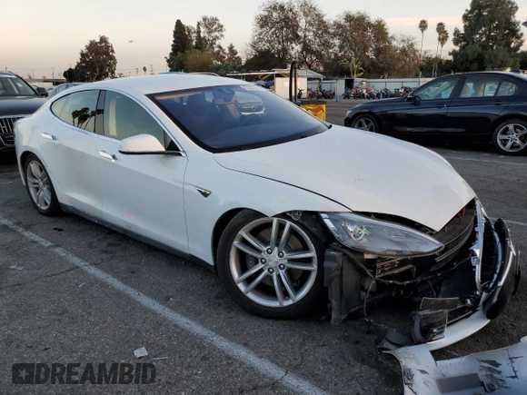 2015 Tesla Model S 85D with VIN 5YJSA1S21FF087461, listed as a Copart auction lot 87027334 with 53,868 mi miles and Salvage Title. Bid and sale history available at carsss.com. Image 4.
