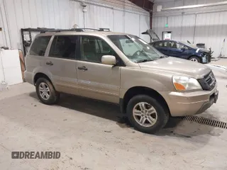 2005 Honda Pilot EX with VIN 2HKYF18475H515604, listed as a IAAI auction lot 42040563 with 320,399 mi miles. Bid and sale history available at carsss.com. Image 1.