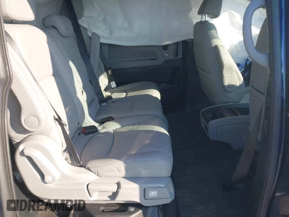 2024 Honda Odyssey EX-L with VIN 5FNRL6H60RB061017, listed as a IAAI auction lot 41399491 with 6,921 mi miles and . Bid and sale history available at DreamBid. Image 8.