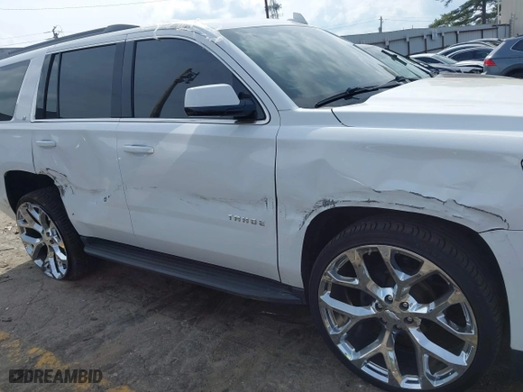 2019 Chevrolet Tahoe LT with VIN 1GNSCBKC6KR345154, listed as a IAAI auction lot 41808536 with 124,325 mi miles. Bid and sale history available at carsss.com. Image 6.