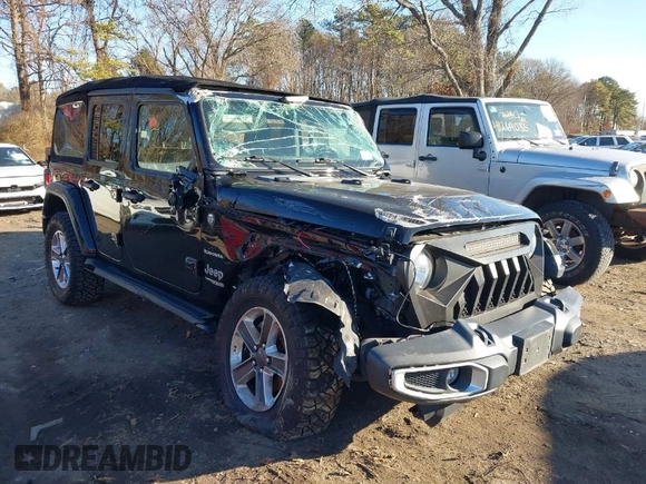 2021 Jeep Wrangler Unlimited Sahara with VIN 1C4HJXEN4MW714133, listed as a IAAI auction lot 41241040 with 82,247 mi miles and . Bid and sale history available at DreamBid. Image 1.