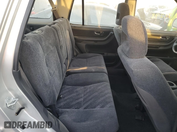 1999 Honda CR-V EX with VIN JHLRD1865XC064542, listed as a Copart auction lot 74730634 with 71,298 mi miles and Salvage Title. Bid and sale history available at carsss.com. Image 10.
