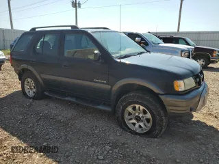 2003 Isuzu Rodeo with VIN 4S2CK58W634313617, listed as a Copart auction lot 70144664 with 179,921 mi miles and Clean Title. Bid and sale history available at DreamBid. Image 4.