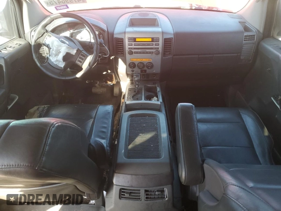2007 Nissan Titan XE z VIN 1N6BA07A67N216434, wystawiony jako Copart lot #47996475 z przebiegiem 121 315 mil mil oraz Czysty tytuł • Clean title. Historia ofert i sprzedaży dostępna na DreamBid. Obrazek 8.