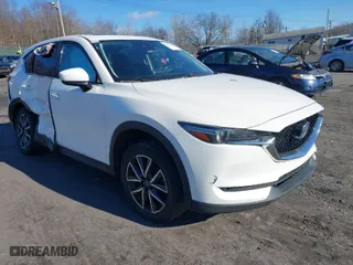 2017 Mazda CX-5 Grand Touring with VIN JM3KFBDL6H0188517, listed as a IAAI auction lot 41093178 with 98,831 mi miles. Bid and sale history available at carsss.com. Image 1.