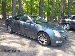 2011 Cadillac CTS Performance with VIN 1G6DL5EY9B0123726, listed as a IAAI auction lot 42525411 with 233,381 mi miles and . Bid and sale history available at DreamBid. Image 1.