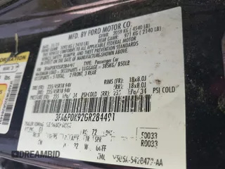 2016 Ford Fusion Titanium with VIN 3FA6P0K92GR284491, listed as a IAAI auction lot 41824323 with 148,016 mi miles. Bid and sale history available at carsss.com. Image 9.