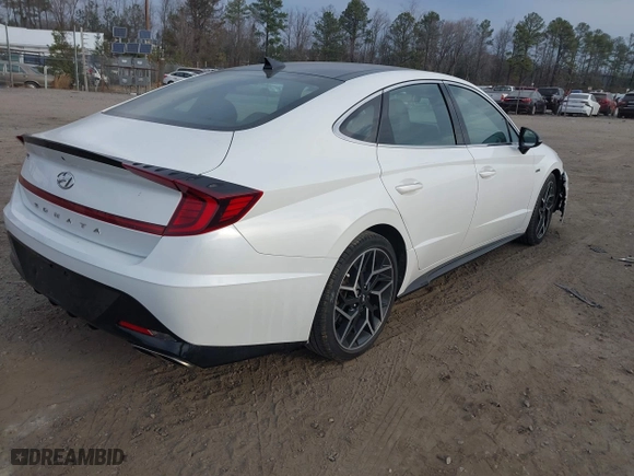 2021 Hyundai Sonata N Line with VIN 5NPEK4JC6MH110611, listed as a IAAI auction lot 41656490 with 52,061 mi miles. Bid and sale history available at carsss.com. Image 4.