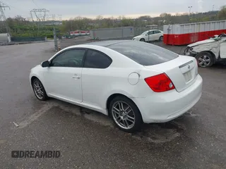2007 Scion tC Spec with VIN JTKDE177270146530, listed as a IAAI auction lot 42033365 with 128,482 mi miles. Bid and sale history available at carsss.com. Image 3.