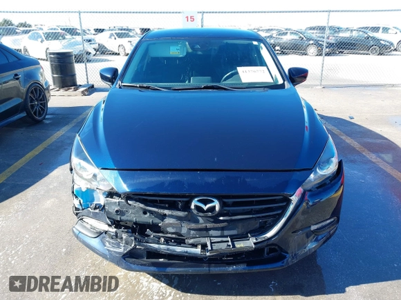 2018 Mazda 3 Touring z VIN 3MZBN1L36JM238646, wystawiony jako IAAI lot #41376772 z przebiegiem 97 261 mil mil oraz . Historia ofert i sprzedaży dostępna na DreamBid. Obrazek 12.