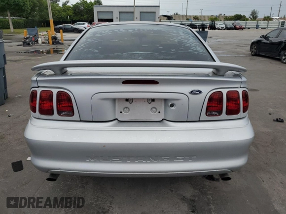 1998 Ford Mustang GT z VIN 1FAFP42XXWF229613, wystawiony jako Copart lot #63231905 z przebiegiem 65 669 mil mil oraz Szkoda całkowita • Salvage title. Historia ofert i sprzedaży dostępna na DreamBid. Obrazek 6.