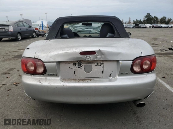 2004 Mazda MX-5 Miata LS with VIN JM1NB353440402453, listed as a Copart auction lot 45064475 with 151,508 mi miles and Salvage title. Bid and sale history available at DreamBid. Image 6.