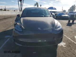 2024 Tesla Model Y Long Range с VIN 7SAYGDEE3RA236473, выставлен на аукционе Copart как лот 77409334 с пробегом 5 822 миль миль и Списание • Salvage title. История ставок и продаж доступна на DreamBid. Изображение 5.