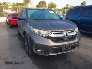 2019 Honda CR-V EX z VIN 5J6RW1H52KA033570, wystawiony jako IAAI lot #42064219 z przebiegiem 108 878 mil mil oraz . Historia ofert i sprzedaży dostępna na DreamBid. Obrazek 1.