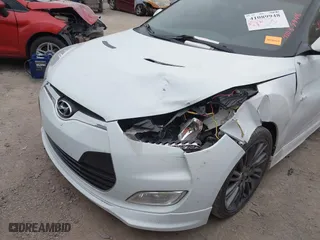2013 Hyundai Veloster RE:MIX with VIN KMHTC6AD6DU135325, listed as a IAAI auction lot 41089948 with 238,459 mi miles. Bid and sale history available at carsss.com. Image 6.