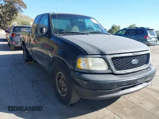 2000 Ford F-150 XL with VIN 1FTRX17W3YNB90314, listed as a IAAI auction lot 41825498 with 369,372 mi miles. Bid and sale history available at carsss.com. Image 1.