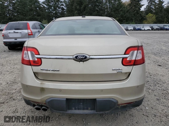 2011 Ford Taurus SEL z VIN 1FAHP2HW4BG171787, wystawiony jako Copart lot #54939445 z przebiegiem 125 882 mil mil oraz Czysty tytuł • Clean title. Historia ofert i sprzedaży dostępna na DreamBid. Obrazek 6.